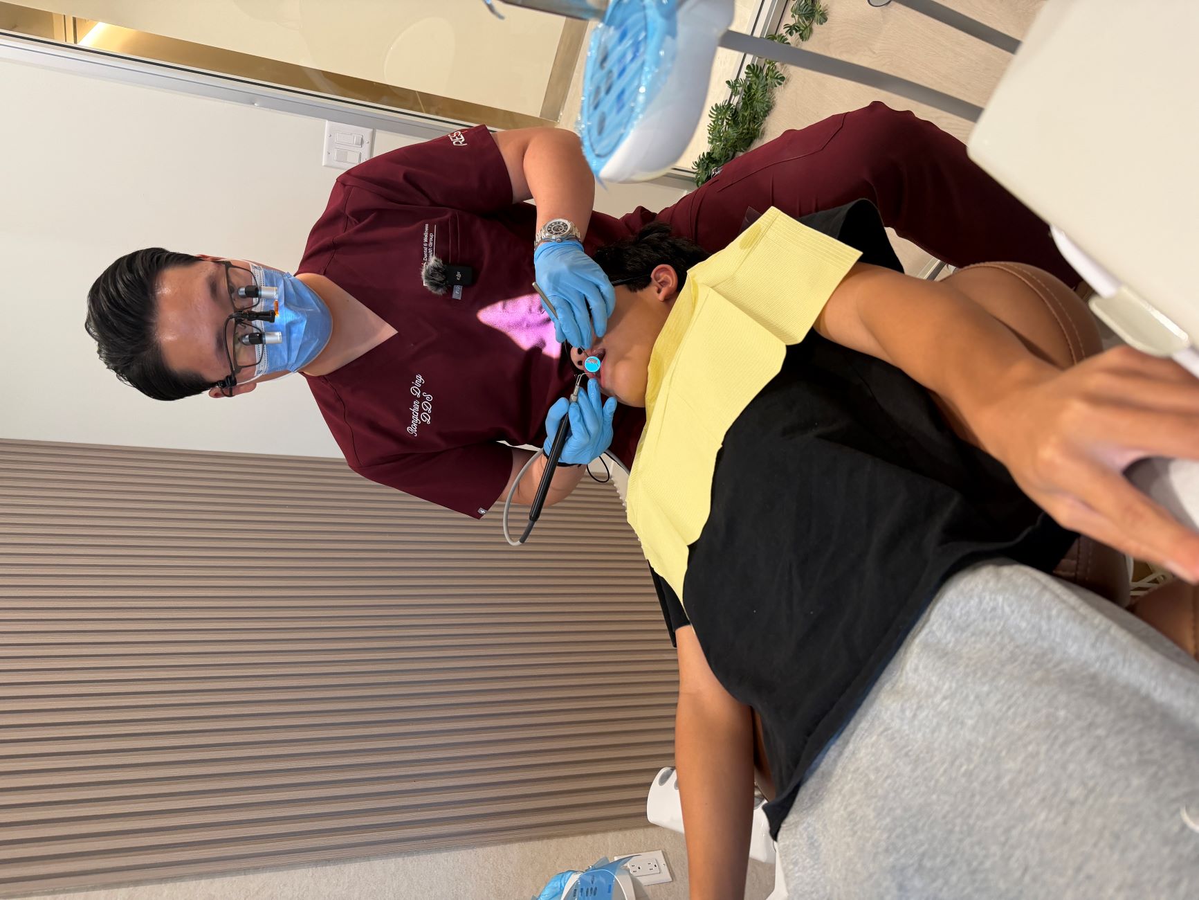Dentist treating patient