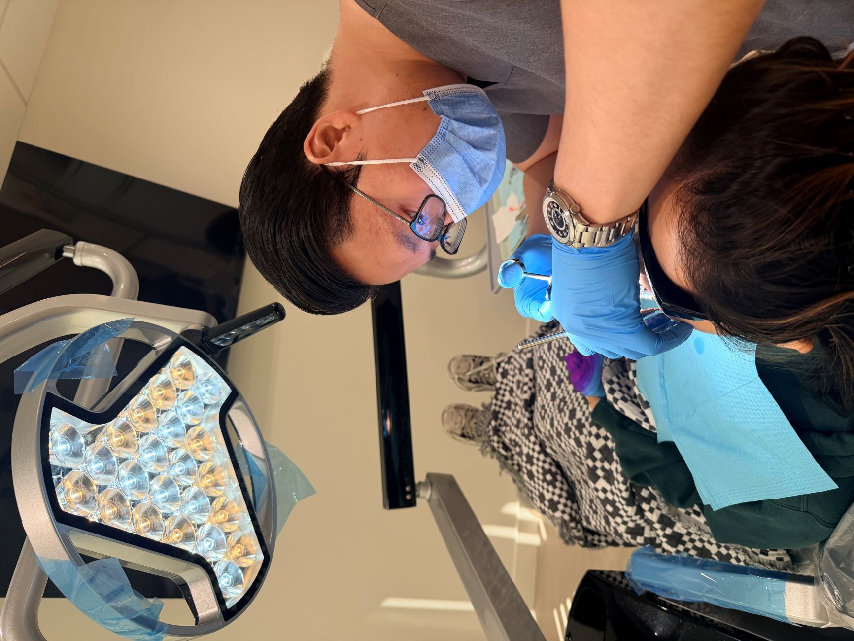 Hygienist performing treatment